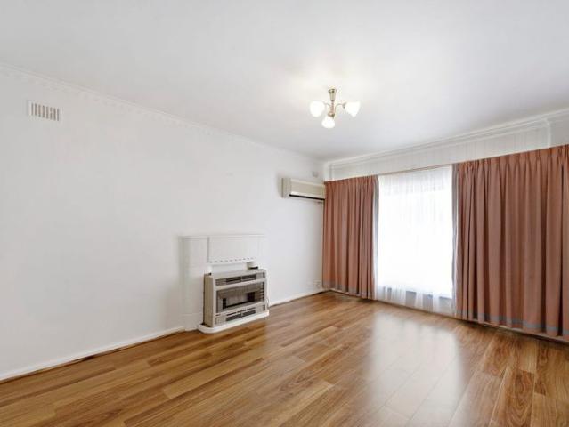 Charming 3 Bedroom Home with drive through garage