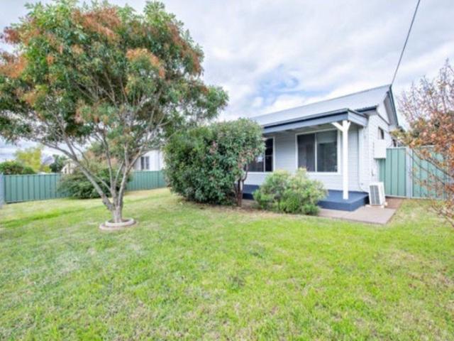 Charming 3 Bedroom Home with Large Fenced Backyard