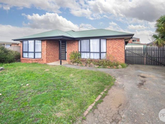 CHARMING 3 BEDROOM HOME WITH LARGE GARAGE