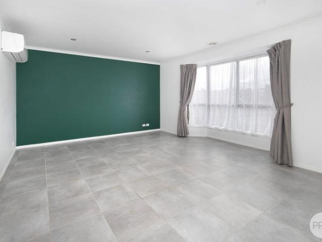 CHARMING 3 BEDROOM HOME WITH LARGE GARAGE