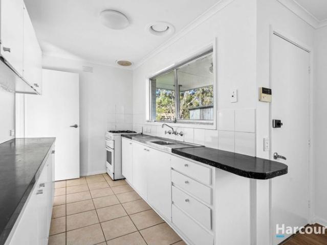 Charming 3 Bedroom Home with Spacious Backyard