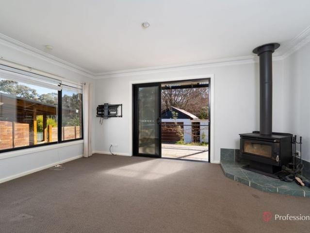 CHARMING 3 BEDROOM HOME WITH SPACIOUS DECKS & QUIET LOCATION