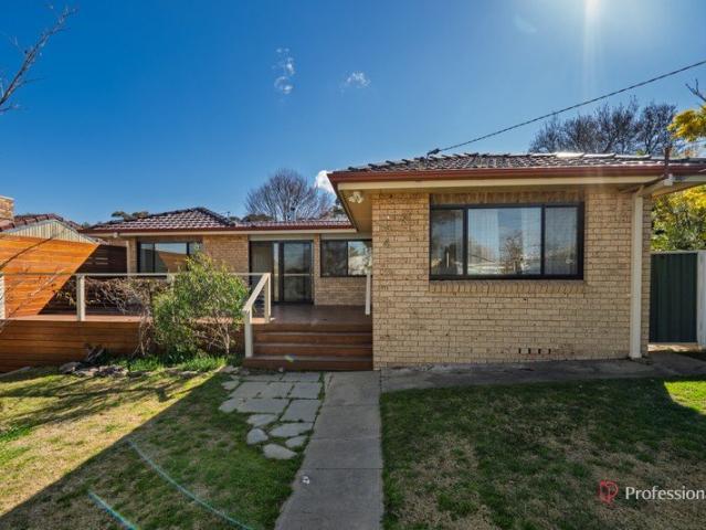 CHARMING 3 BEDROOM HOME WITH SPACIOUS DECKS & QUIET LOCATION