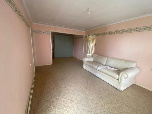 Charming 3 Bedroom Home with Spacious Yard & Great Potential