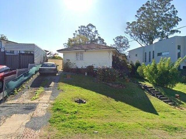 Charming 3 Bedroom Home with Spacious Yard & Great Potential