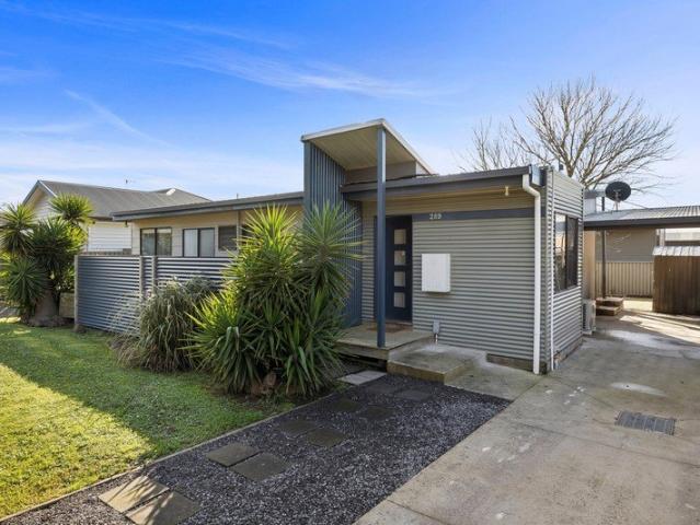 Charming 3 Bedroom Unit with Private Backyard