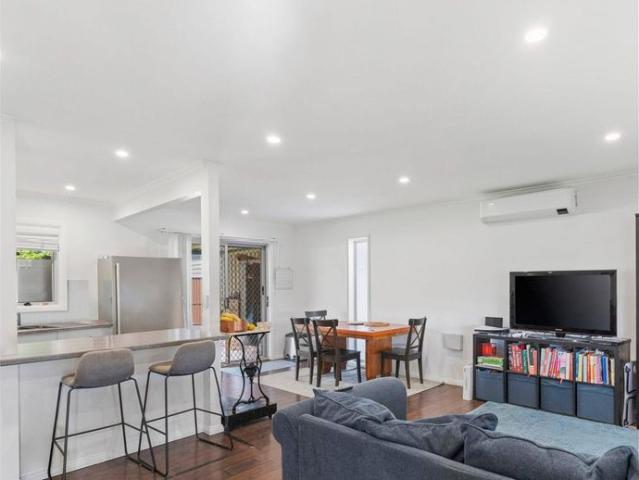 CHARMING THREE BEDROOM COASTAL HOME IN A PREMIER POCKET