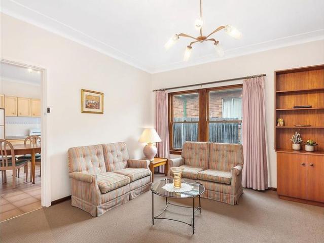 CHARMING THREE BEDROOM FAMILY HOME WITH LARGE BACKYARD
