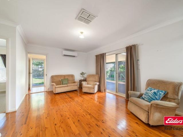 CHARMING THREE BEDROOM HOME IN GREAT LOCATION