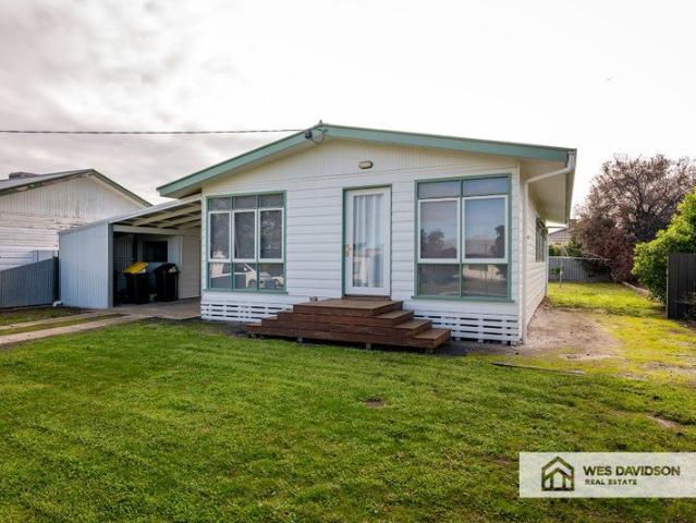 Charming Three Bedroom Home with Comfort and Convenience