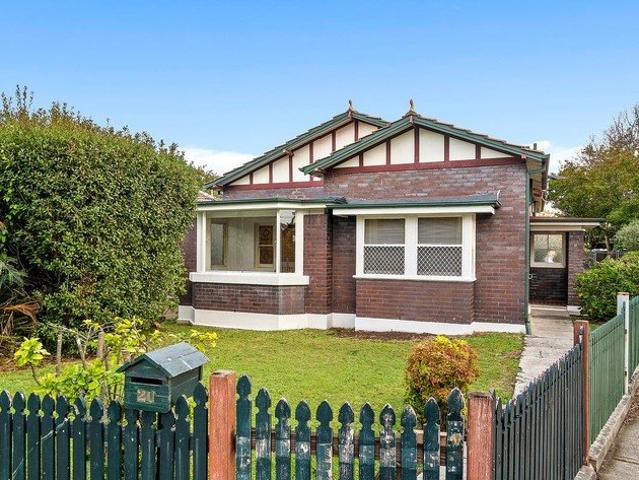 Charming Three Bedroom Home with Expansive Backyard