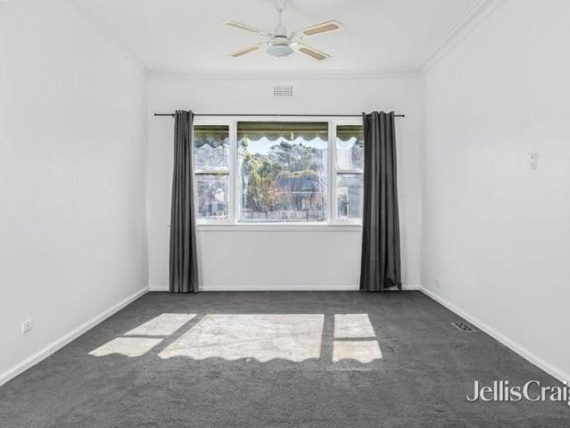 Charming three bedroom home with large yard and big shed!