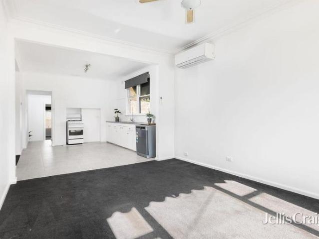 Charming three bedroom home with large yard and big shed!