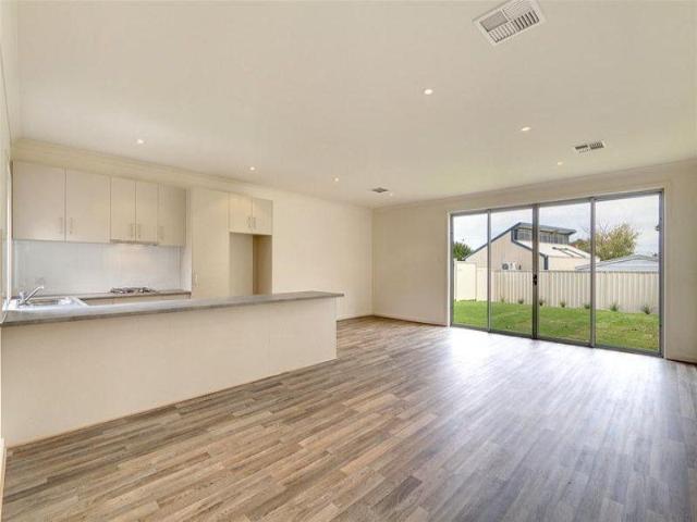 Charming Three Bedroom Home with Solar & Close to All Amenities!