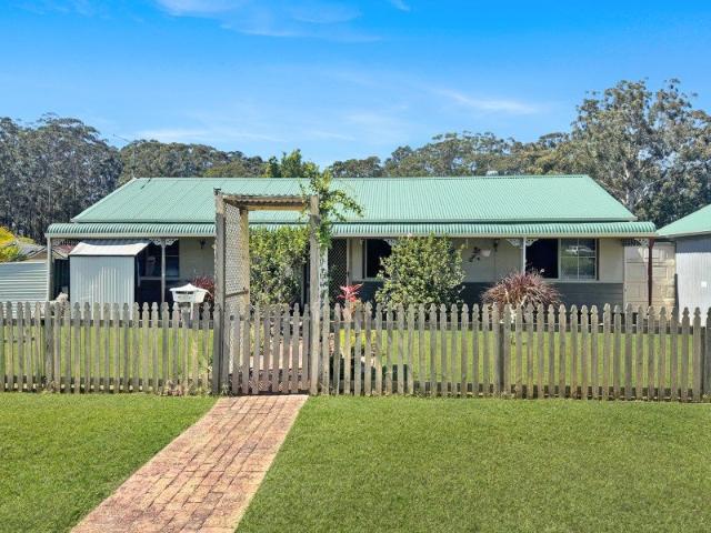Charming Three Bedroom Home with Spacious Yard