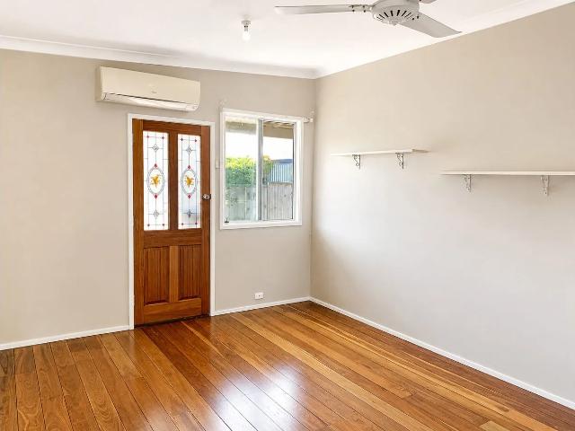 Charming Three Bedroom Home with Sunroom, Entertaining Area and Double Garage