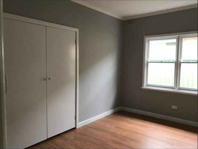 Charming Three Bedroom Weatherboard Cottage with Modern Comforts