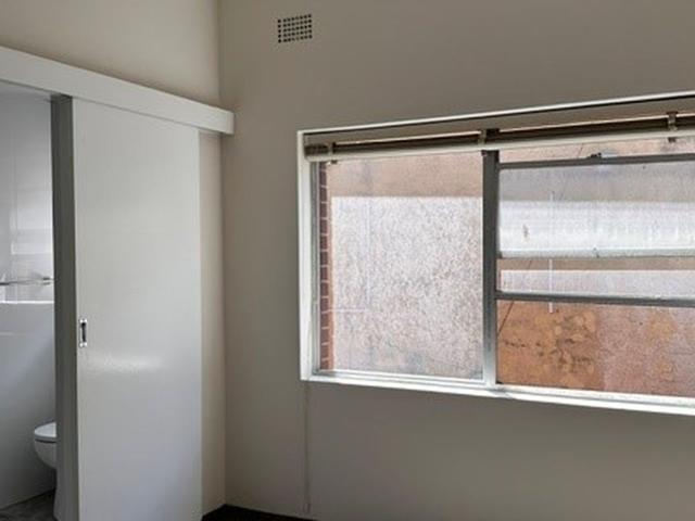 Charming Top floor Unit with Renovated Bathroom!