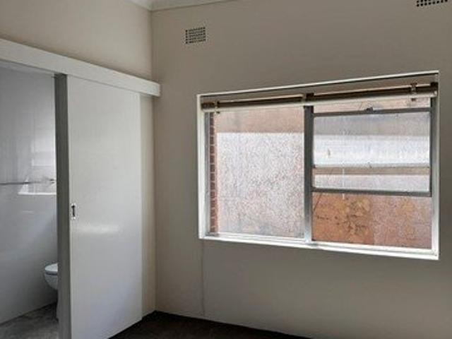 Charming Top floor Unit with Renovated Bathroom!