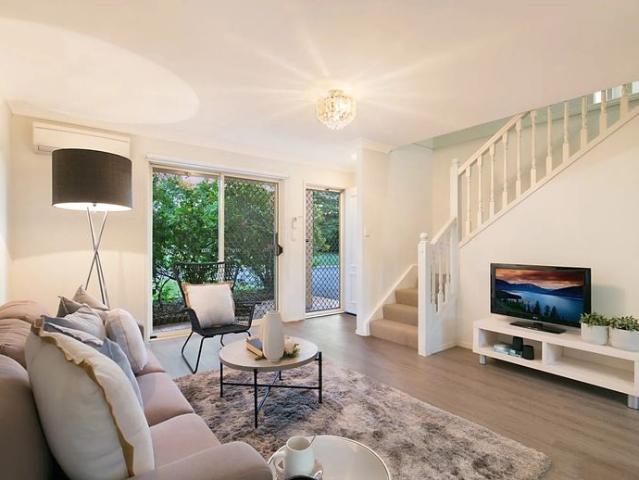 Charming Townhouse Living in a Peaceful Setting