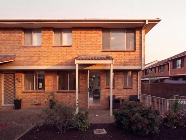 Charming Townhouse with Double Garage and Inviting Courtyard