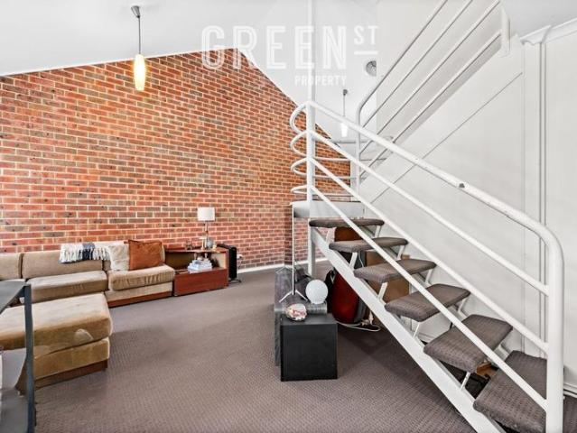 Charming Two Bedroom Townhouse in a Convenient Location