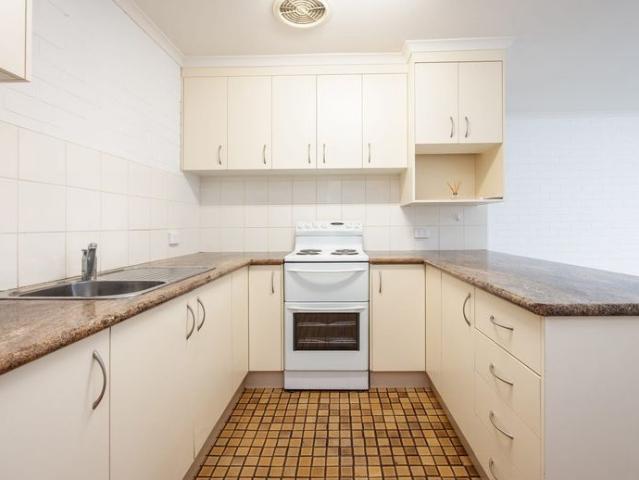 Charming Two Bedroom Unit in a Quiet Court Location