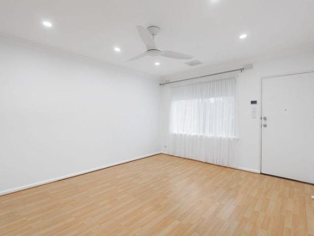Charming Two Bedroom Unit with Beautiful Garden