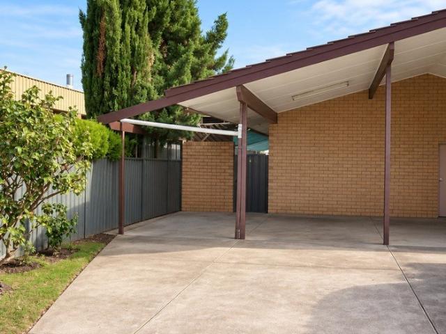 Charming Two Bedroom Unit with Hardwood Floors and Rear Garden