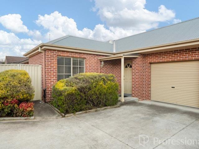 Charming Two Bedroom Unit with Open Living