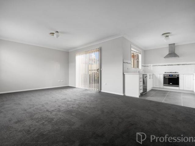 Charming Two Bedroom Unit with Open Living