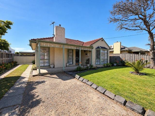 Charming Two Bedroom Home with Entertainers Backyard