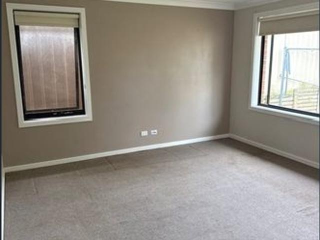 Charming Two Bedroom Home with Secure Backyard & Lock Up Garage