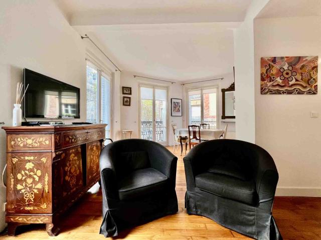Charming Two Room Furnished Apartment with Eiffel Tower View