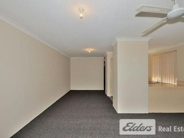 Charming Unit with Courtyard and Carport