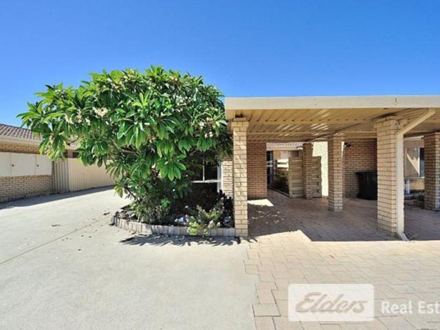 Charming Unit with Courtyard and Carport