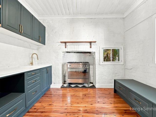 Charming Updated Cottage Moments from Town Centre
