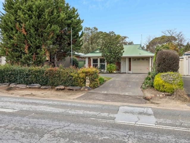 Charming Villa with 4 Sheds!