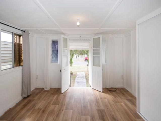 Charming Walkervale Home with Huge Backyard & Covered Entertaining Deck!