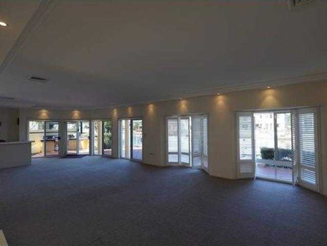 Charming Waterfront Home in Secure Runaway Bay Complex