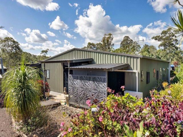 Charming Acreage Retreat with Endless Possibilities