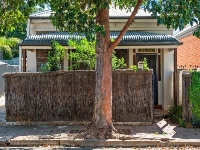 Charming and contemporary, this Hyde Park residence offers a perfect blend of character and modern convenience