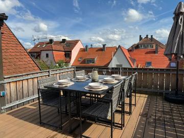 Charming and central flat with roof terrace, kitchen, parking space