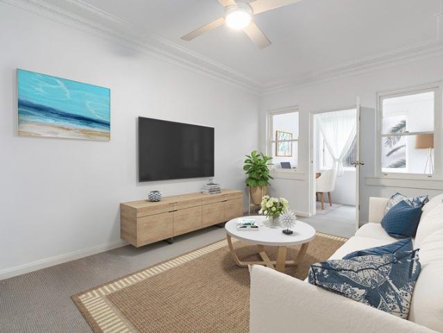 Top Floor Apartment at the Rear of a Boutique Art Deco Block with Lock Up Garage