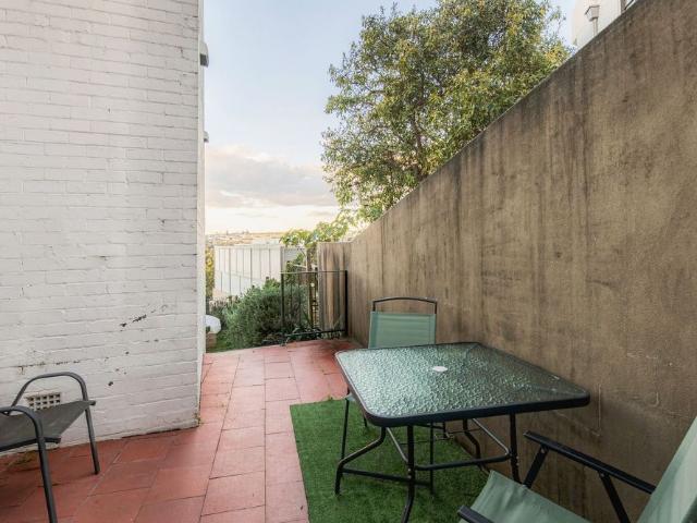 Charming Art Deco Semi Like Residence with Courtyard Access And Serene Views