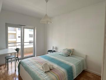 Charming bedroom with sunny balcony