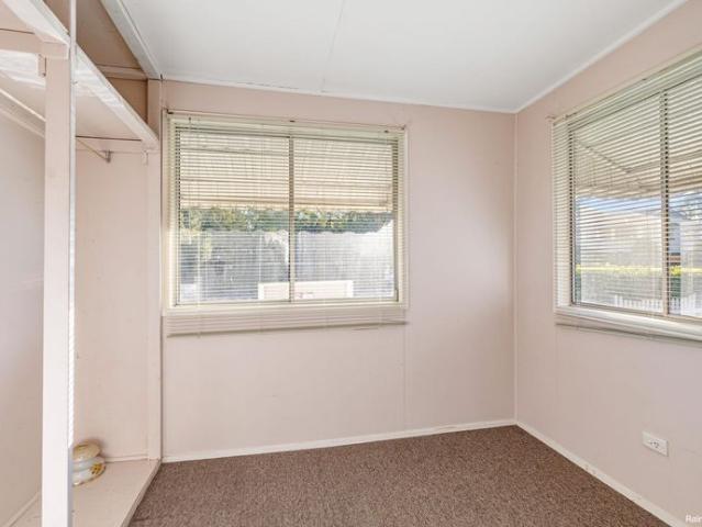Charming Booval Home with Exceptional 9m x 9m Shed