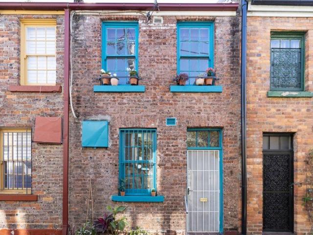 Charming brick terrace in storybook laneway