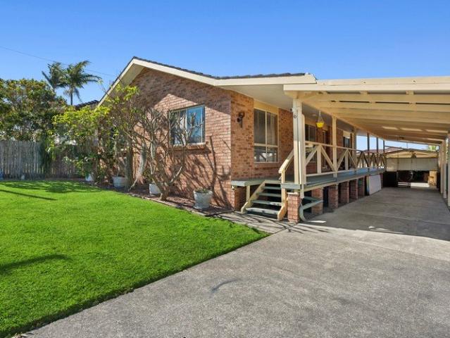 Charming Brick and Tile Home with Side Access