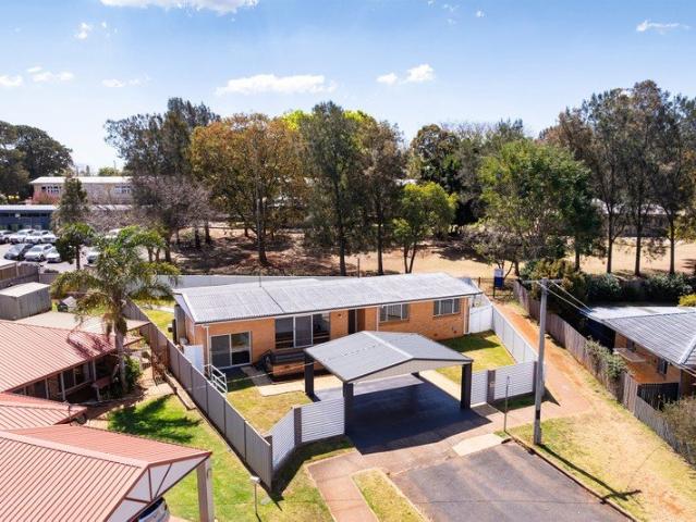 Charming Brick Family Home in Prime Rangeville Location